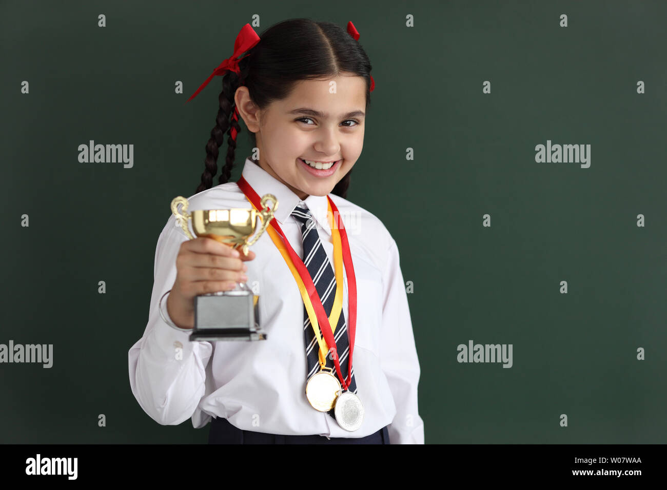 Indian school girl medal hi-res stock photography and images - Alamy