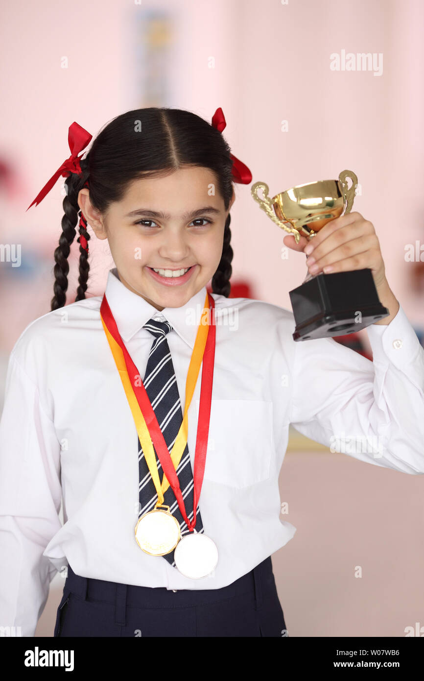 Indian school girl medal hi-res stock photography and images - Alamy