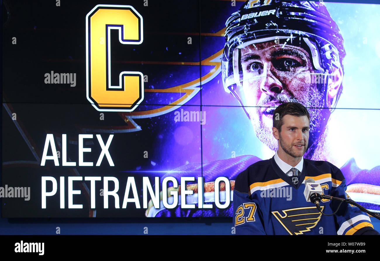 St. Louis Blues Alex Pietrangelo holds his new sweater after he was named  the 21st team captain of the St. Louis Blues at the Scottrade Center in St.  Louis on August 25