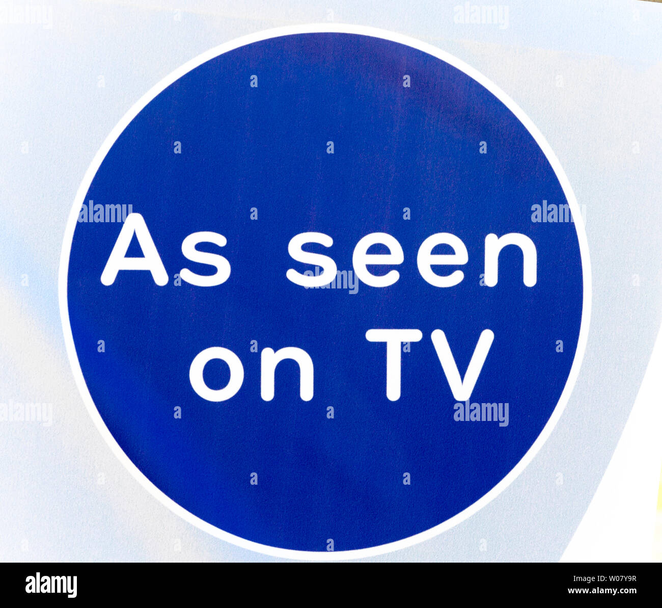 'As Seen on TV' Sign, in white and blue UK Stock Photo