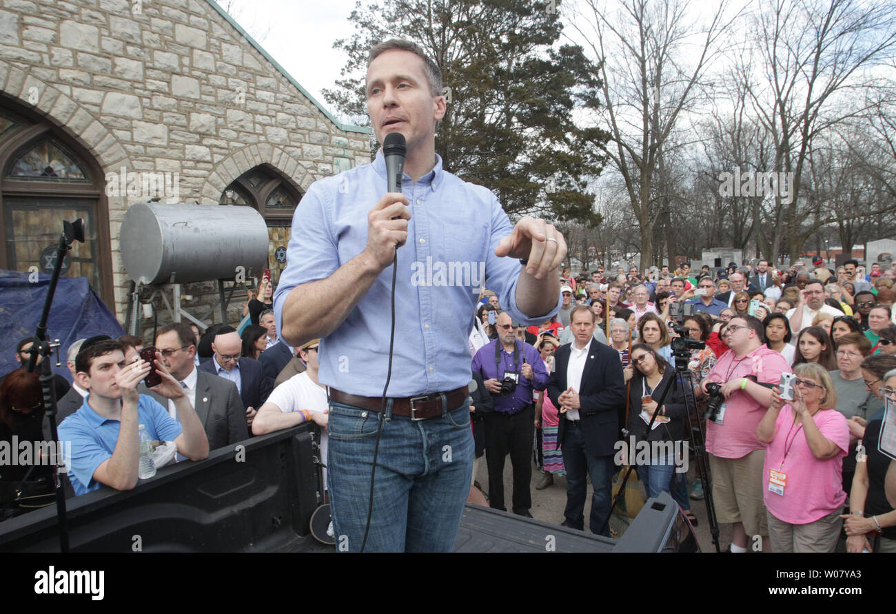 From the bed of a pickup truck, Missouri Governor Eric Greitens addresses thousands that have shown up for the cleanup of Chesed Shel Emeth Cemetery in University City, Missouri on February 22, 2017. Vandals toppled nearly 200 headstones on February 20, 2017 in the Jewish cemetery, prompting the community cleanup effort that attracted over four thousand people.  Photo by Bill Greenblatt/UPI Stock Photo