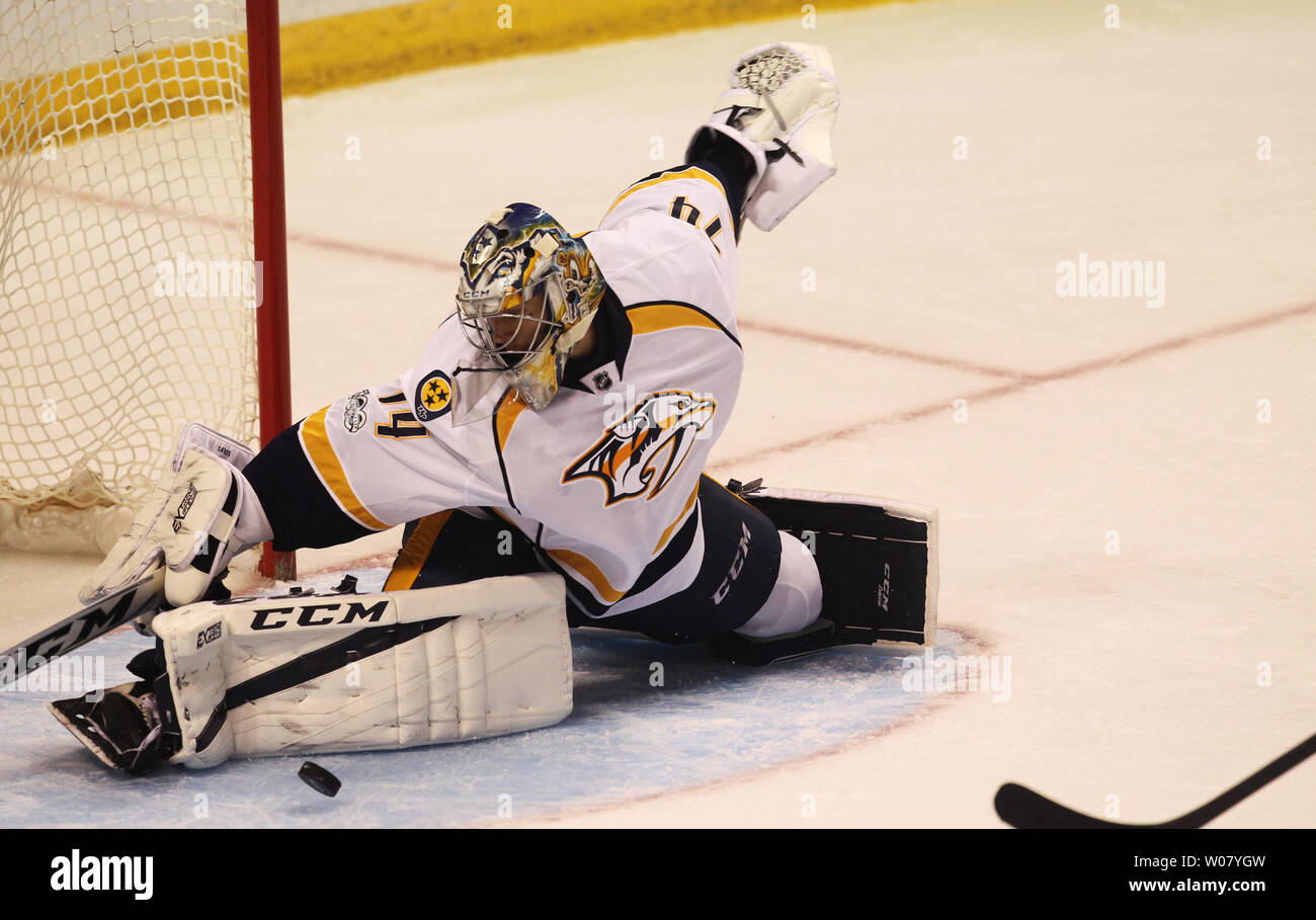 Nashville Predators goaltender Juuse Saros makes a kick save in the first period against the St. Louis Blues at the Scottrade Center in St. Louis on April 2, 2017.    Photo by Bill Greenblatt/UPI Stock Photo