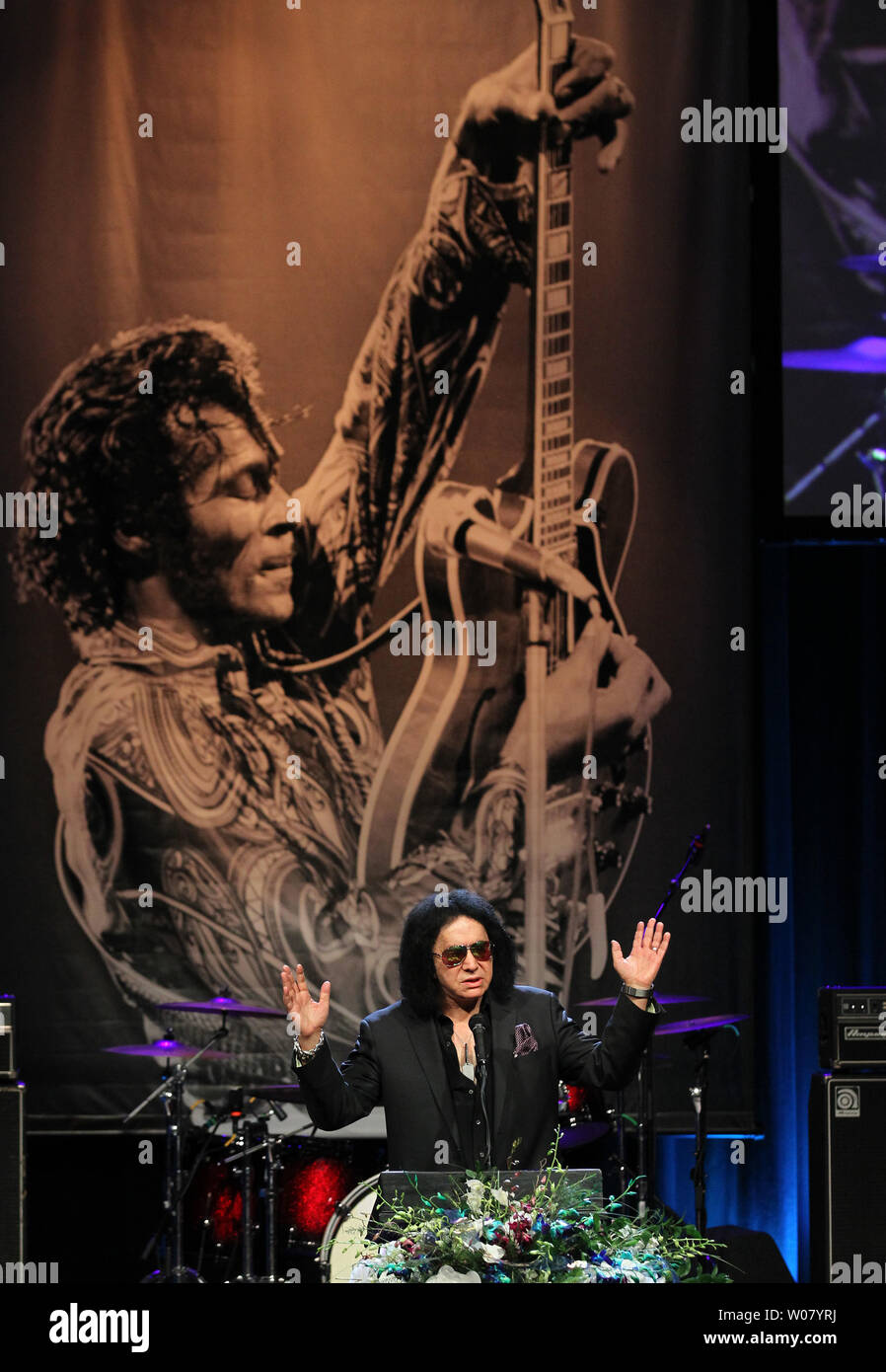 Kiss band member Gene Simmons makes his remarks during a memorial service  for the late rock and roller Chuck Berry at the Pageant Theater in St.  Louis on April 9, 2017. Berry