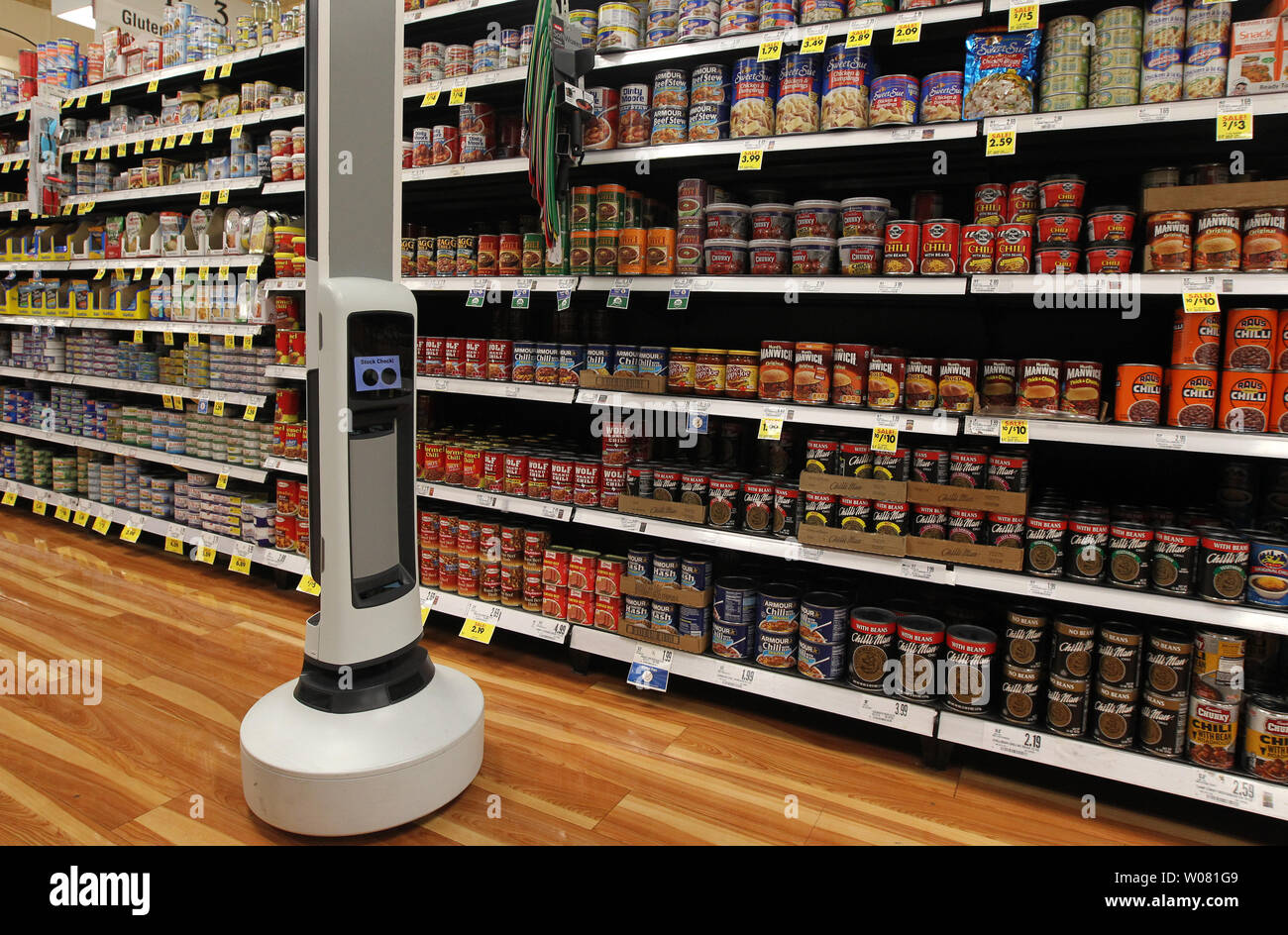 Tally the robot makes his way down an isle, checking the inventory of chili at the Schnucks Supermarket in Richmond Heights, Missouri on August 7, 2017. The 30-pound robot is equipped with sensors to help it navigate through the store, detecting product that is not fully stocked and avoiding customer carts. That data is sent to store management so changes can be made. Tally will be tested over six weeks.   Photo by Bill Greenblatt/UPI Stock Photo