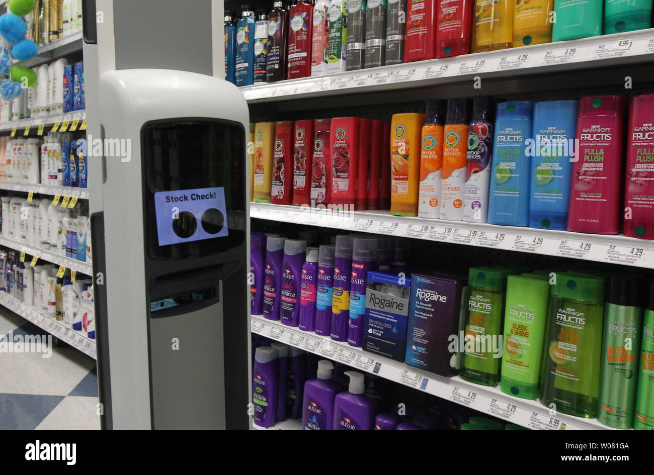 Tally the robot makes his way down an isle, checking the inventory of shampoos at the Schnucks Supermarket in Richmond Heights, Missouri on August 7, 2017. The 30-pound robot is equipped with sensors to help it navigate through the store, detecting product that is not fully stocked and avoiding customer carts. That data is sent to store management so changes can be made. Tally will be tested over six weeks.   Photo by Bill Greenblatt/UPI Stock Photo