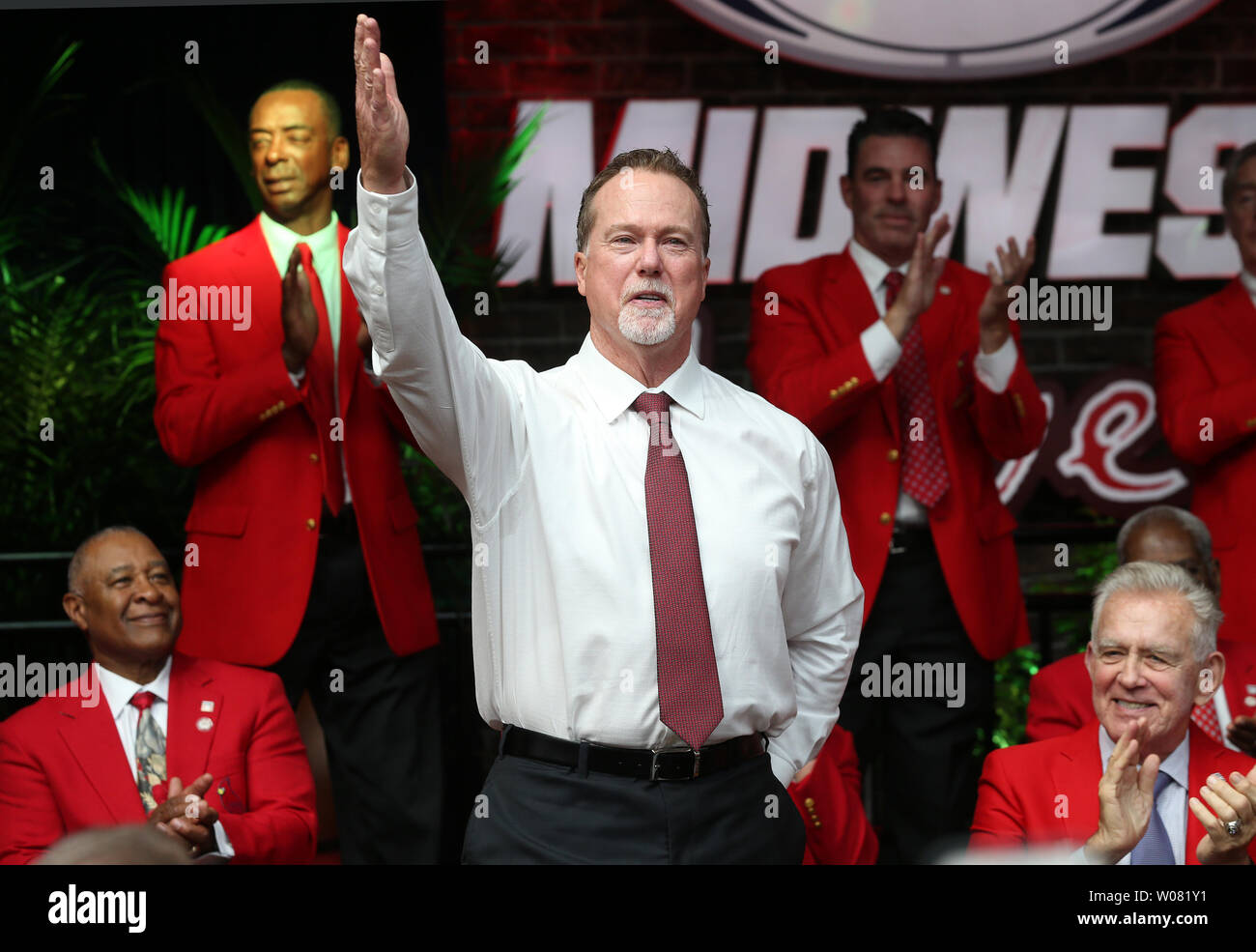 Newly inducted St. Louis Cardinals Hall of Fame member Mark McGwire waves to the fans as he is introduced during the St. Louis Cardinals Hall of Fame Induction ceremonies in St. Louis on August 26, 2017. McGwire played 4 1/2 years with the Cardinals breaking Roger Maris' home run record, hitting 70 home runs in 1998 and is now the bench coach for the San Diego Padres.       Photo by Bill Greenblatt/UPI Stock Photo