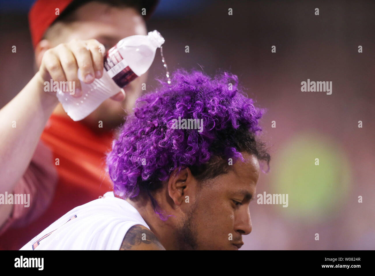 St. Louis Cardinals Carlos Martinez gets water poured on his