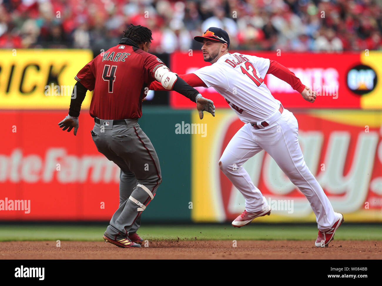 Arizona Diamondbacks Ketel Marte is tagged out by St. Louis Cardinals Paul DeJong after overrunning second base in the fourth inning at Busch Stadium in St. Louis on April 8, 2018.        Photo by Bill Greenblatt/UPI Stock Photo