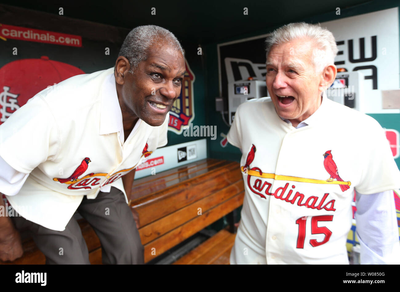 National Baseball Hall of Fame members former St. Louis Cardinals pitcher Bob  Gibson (L) and catcher Tim McCarver share a laugh before the 1968 team  reunion before the Philadelphia Phillies-St. Louis Cardinals