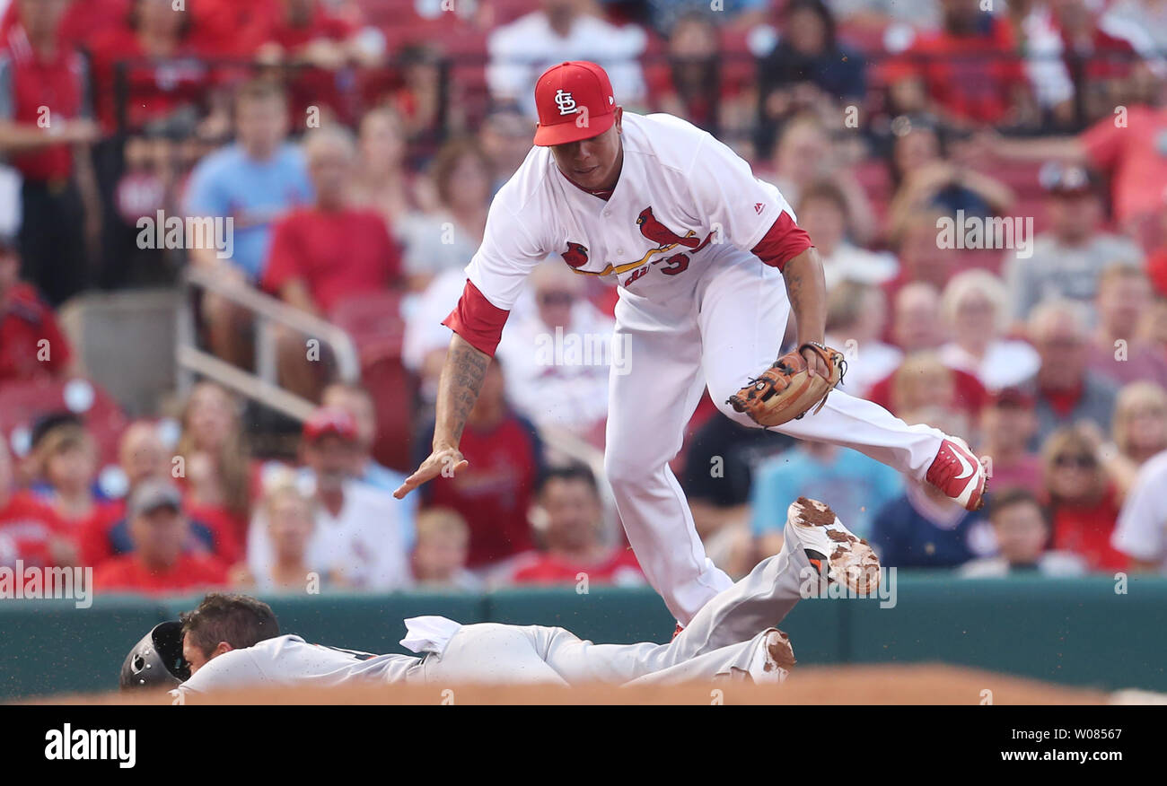 Miami Marlins Miguel Rojas slides into third base past St. Louis ...