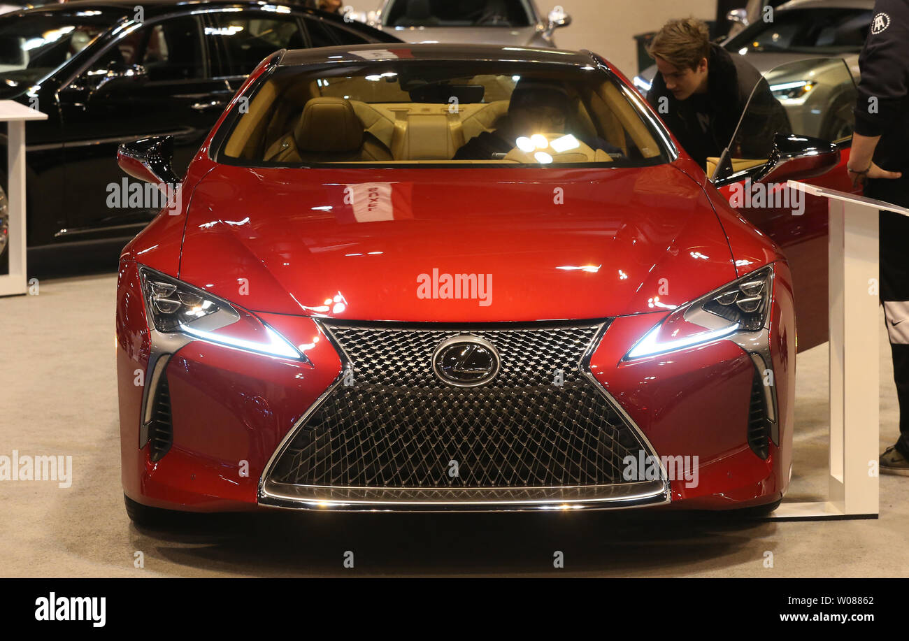Attendees check out the sporty looking Lexus LC 500, during Day 2 of the St. Louis Auto Show in St. Louis on January 25, 2019. Photo by BIll Greenblatt/UPI Stock Photo