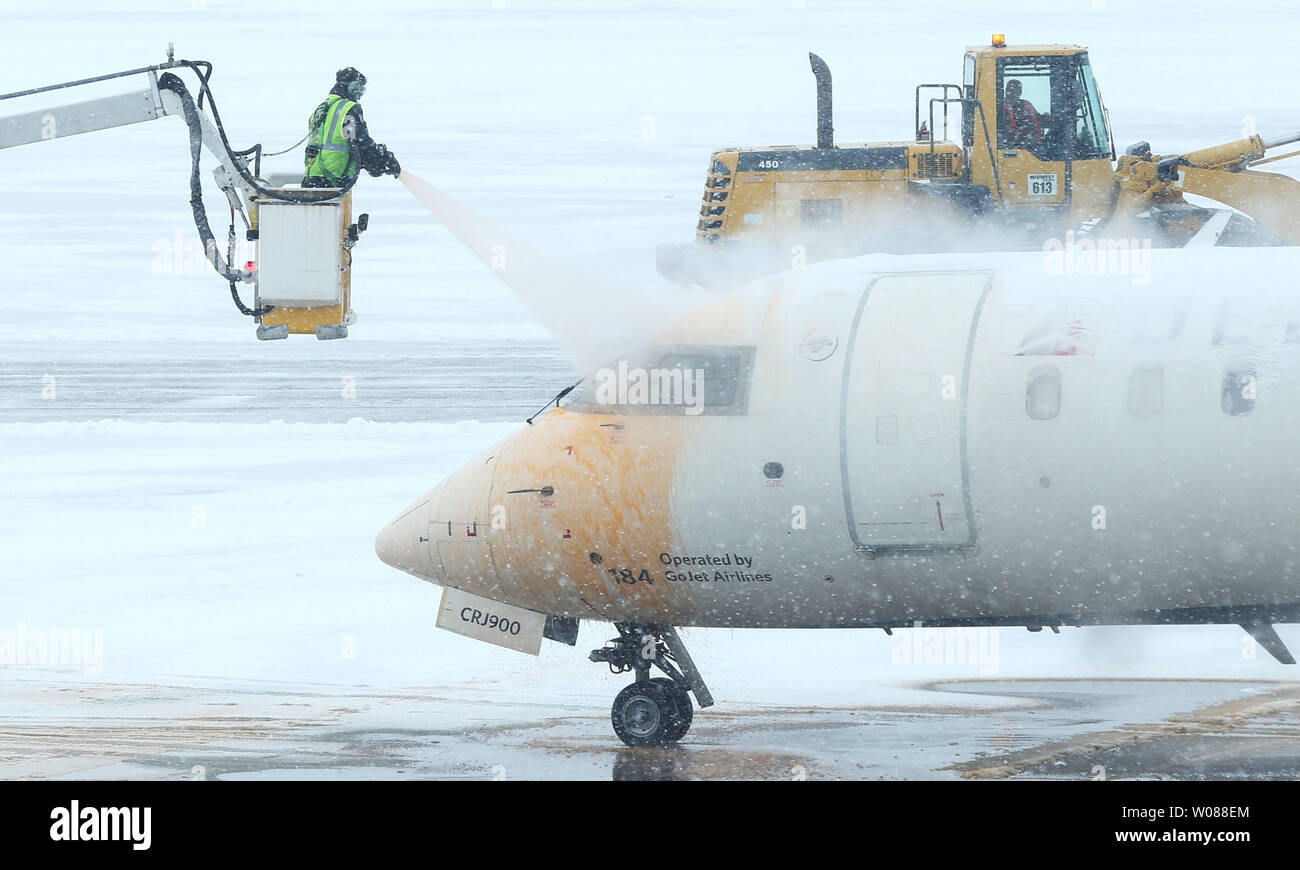 A Continental jet is sprayed with de-icing fluid before takeoff during a heavy snow storm at St. Louis-Lambert International Airport in St. Louis on March 3, 2019. The morning storm dumped 2-3 inches on the area. Photo by Bill Greenblatt/UPI Stock Photo