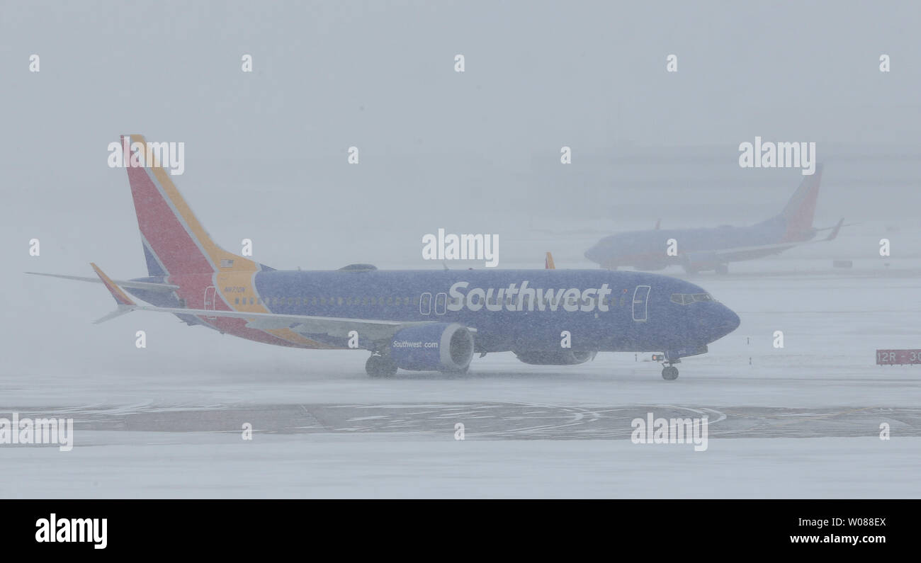 Southwest planes taxi to gates during a heavy snow storm at St. Louis-Lambert International Airport in St. Louis on March 3, 2019. The morning storm dumped 2-3 inches on the area. Photo by Bill Greenblatt/UPI Stock Photo