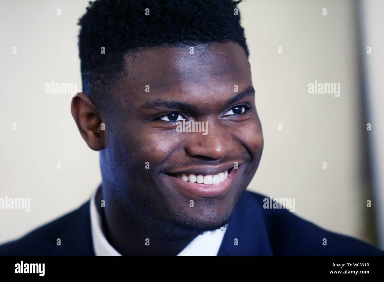 Zion Williamson of Duke University smiles as he talks with reporters before ceremonies at the Missouri Athletic Club in St. Louis on April 15, 2019. Williamson, a freshman was the winner of the Wayman Tisdale Freshman of the Year and Oscar Robertson Player of the Year awards. Williamson made it official and announced his intentions to enter the 2019 NBA Draft.  Photo by Bill Greenblatt/UPI Stock Photo
