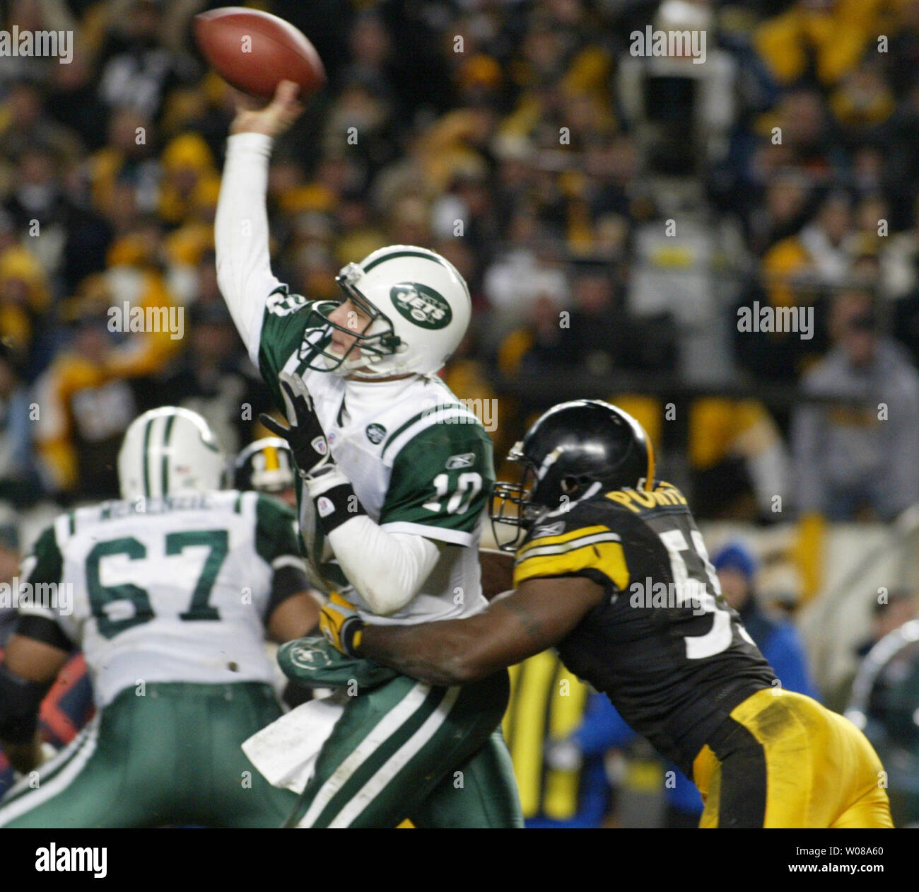 New York Jets Quarterback Chad Pennington is pressured by Pittsburgh  Steelers Joey Porter during the second quarter at Heinz Field in  Pittsburgh, Pennsylvania, on January 15, 2005. The Steelers went on to