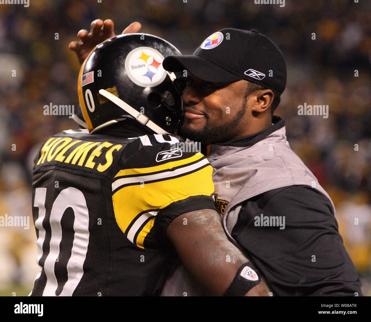 20 December: Pittsburgh Steelers Santonio Holmes (10) runs after catching a  pass during the NFL football game between the Green Bay Packers and the Pittsburgh  Steelers at Heinz Field in Pittsburgh, Pennsylvania.