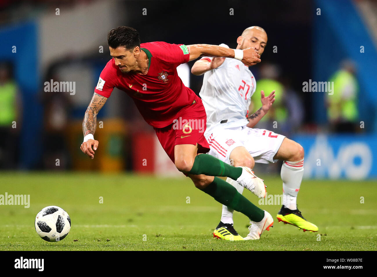 Jose Fonte of Portugal (L) competes for the ball with David Silva of Spain during the 2018 FIFA World Cup Group B match at Fisht Stadium in Sochi, Russia on June 15, 2018. Photo by Chris Brunskill/UPI Stock Photo