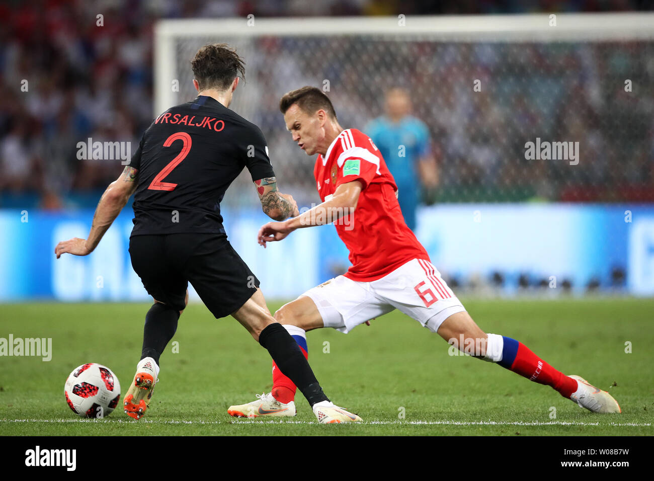 Denis Cheryshev (R) of Russia competes for the ball with Sime Vrsaljko of Croatia during the 2018 FIFA World Cup quarter-final match at Fisht Stadium in Sochi, Russia on July 7, 2018. Croatia beat Russia 4-3 on penalties to advance to the semi-finals. Photo by Chris Brunskill/UPI Stock Photo