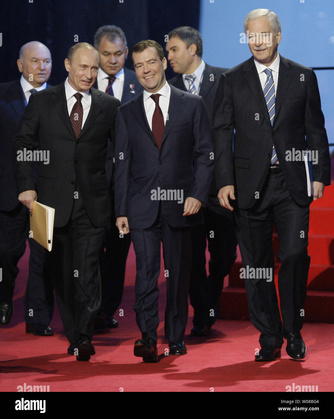 (L-R) Russian Prime Minister Vladimir Putin, President Dmitry Medvedev and Parliament Speaker and Chairman of the United Russia party council Boris Gryzlov arrive at the United Russia party's congress in St. Petersburg on November 21, 2009. UPI/Anatoli Zhdanov Stock Photo