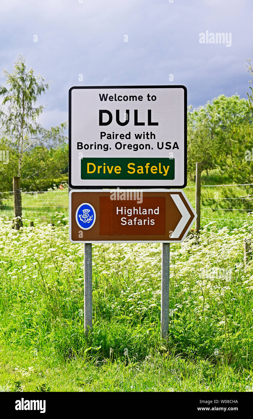 Village sign. 'DULL Paired with Boring, Oregon, USA.' Drive Safely. Highland Safaris. Dull, Perth and Kinross, Scotland, United Kingdom, Europe. Stock Photo