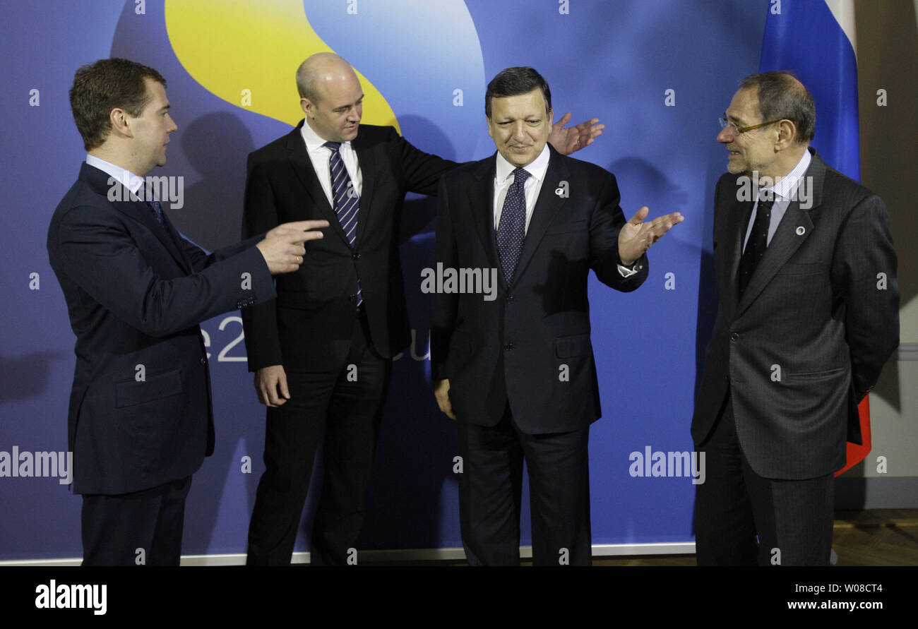 Russian President Dmitry Medvedev (L) is welcomed by Swedish Prime Minister Fredrick Reinfeldt, European Commission President Jose Manuel Barroso (2nd R) and EU Foreign Policy Javier Solana (R) at the begging of  a one-day EU-Russia summit in Stockholm on November 18, 2009. UPI/Anatoli Zhdanov Stock Photo