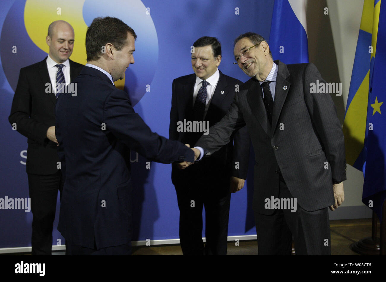 Russian President Dmitry Medvedev (2nd L) shakes hands with EU Foreign Policy Javier Solana (R) as Swedish Prime Minister Fredrick Reinfeldt (L) and European Commission President Jose Manuel Barroso smile at the begging of  a one-day EU-Russia summit in Stockholm on November 18, 2009. UPI/Anatoli Zhdanov Stock Photo