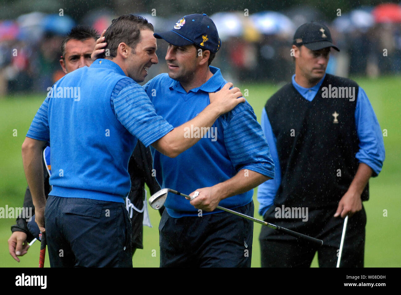 European team member Sergio Garcia (L) and Jos Maria Olaz‡bal celebrate after defeating Phil Mickelson and Chris Dimarco, during the second day of the Ryder Cup tournament at The K Club in Straffan, Ireland on September 23, 2006. The Americans succeeded to the Europeans after Garcia won the 16th hole. (UPI Photo/Kevin Dietsch) Stock Photo