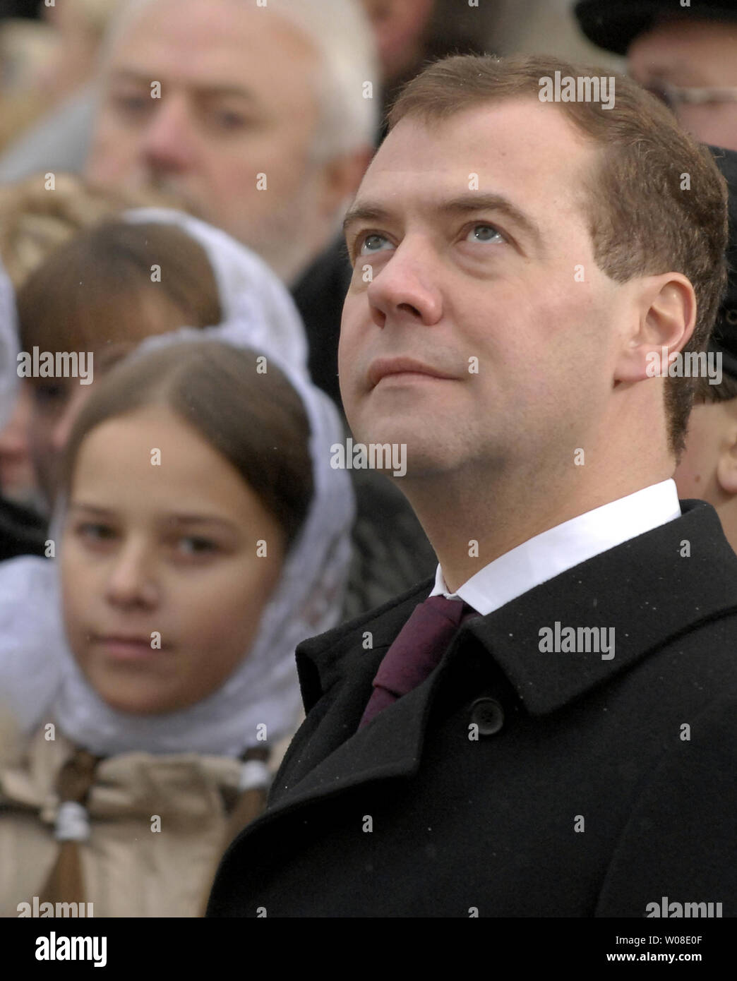 Russian President Dmitry Medvedev stands during the unveiling ceremony of a new chapel to mark the National Unity Day in the ancient Russian town of Suzdal, about 200 km (124 miles) east of Moscow, on November 4, 2009. UPI/Alex Volgin Stock Photo