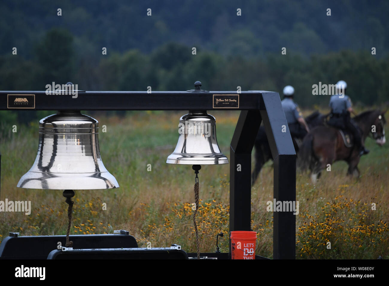 Mounted National Park Service police patrol behind bells to be rung during a ceremony marking the anniversary of 9/11 at the Flight 93 National Memorial in Shanksville, Pennsylvania on Tuesday, September 11, 2018. President Trump will attend the ceremony marking the 17th anniversary of the crash of United Flight 93 on September 11, 2001.                    Photo by Pat Benic/UPI Stock Photo