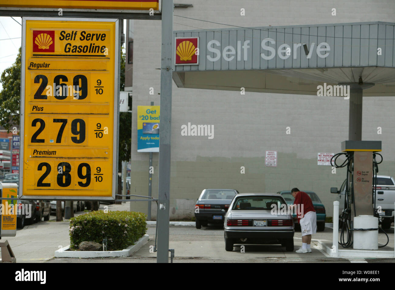 A  motorist stops for some expensive gas at a station on South Van Ness Ave.  in San Francisco, CA, March 17, 2004.  Gas prices in California are even higher than most in the nation.  (UPI PhotoTerry Schmitt) Stock Photo