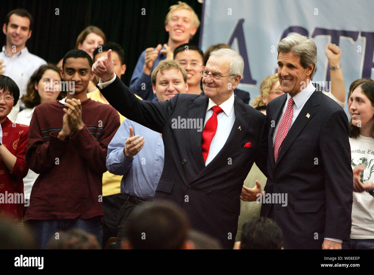Former Chrysler Motors Chairman Lee Iacocca (L) waves to the crowd as he enters a campaign rally with Democratic presidential candidate, U.S. Senator John Kerry at San Jose State University in San Jose, CA on June 24, 2004.   (UPI Photo/Terry Schmitt) Stock Photo