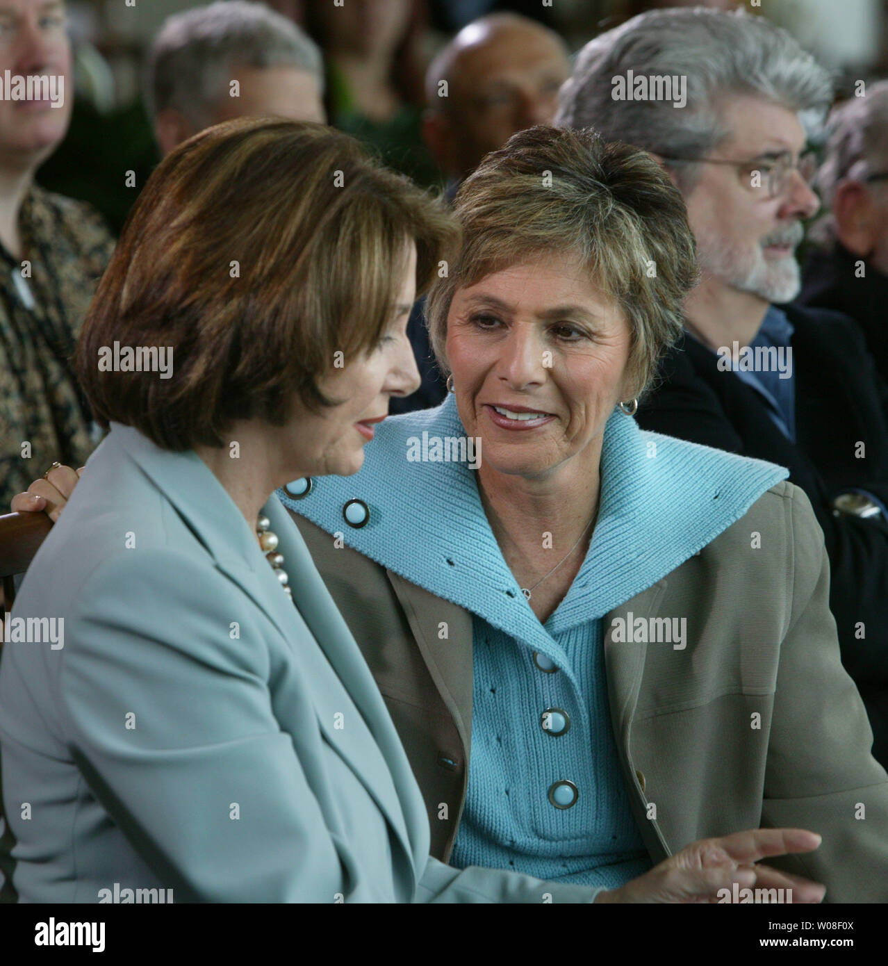 Rep Nancy Pelosi D Ca And Sen Barbara Boxer D Ca Chat With George Lucas In The Background At The Preview Opening Of The New George Lucas Campus The Letterman Digital Arts Center In
