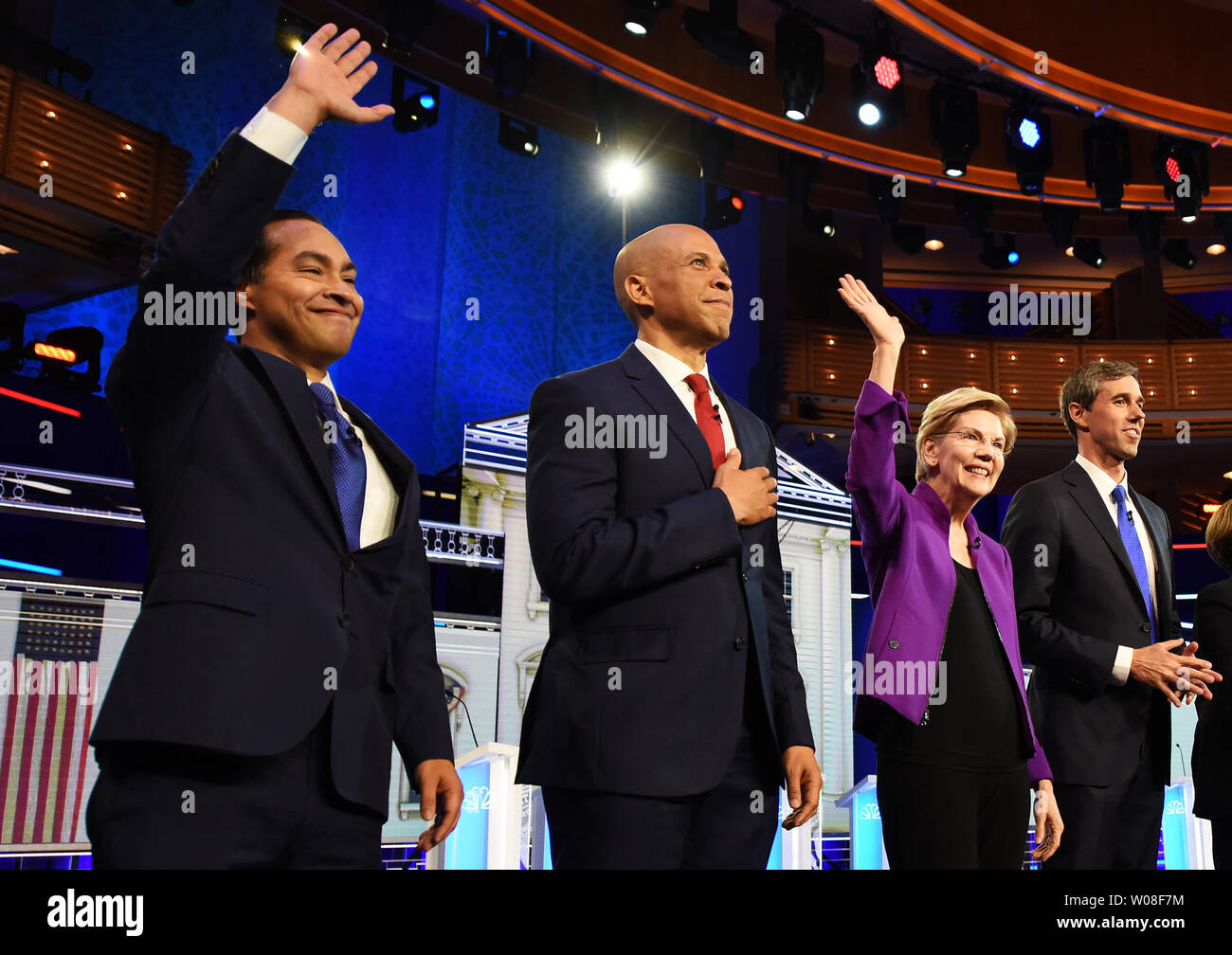 Miami, United States. 26th June, 2019. Democratic presidential candidates (from L) Julian Castro, Cory Booker, Elizabeth Warren, and Beto O'Rourke take the stage at the start of the first Democratic presidential primary debate for the 2020 election on June 26, 2019 at the Knight Concert Hall at the Adrienne Arsht Center for the Performing Arts in Miami, Florida. Credit: Paul Hennessy/Alamy Live News Stock Photo