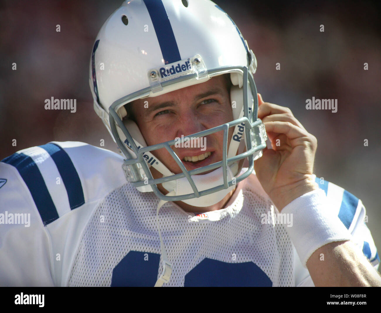 Indianapolis Colts QB Peyton Manning snaps on his helmet to  play against the San Francisco 49ers at Monster Park in San Francisco on October 9, 2005.  (UPI Photo/Terry Schmitt)) Stock Photo