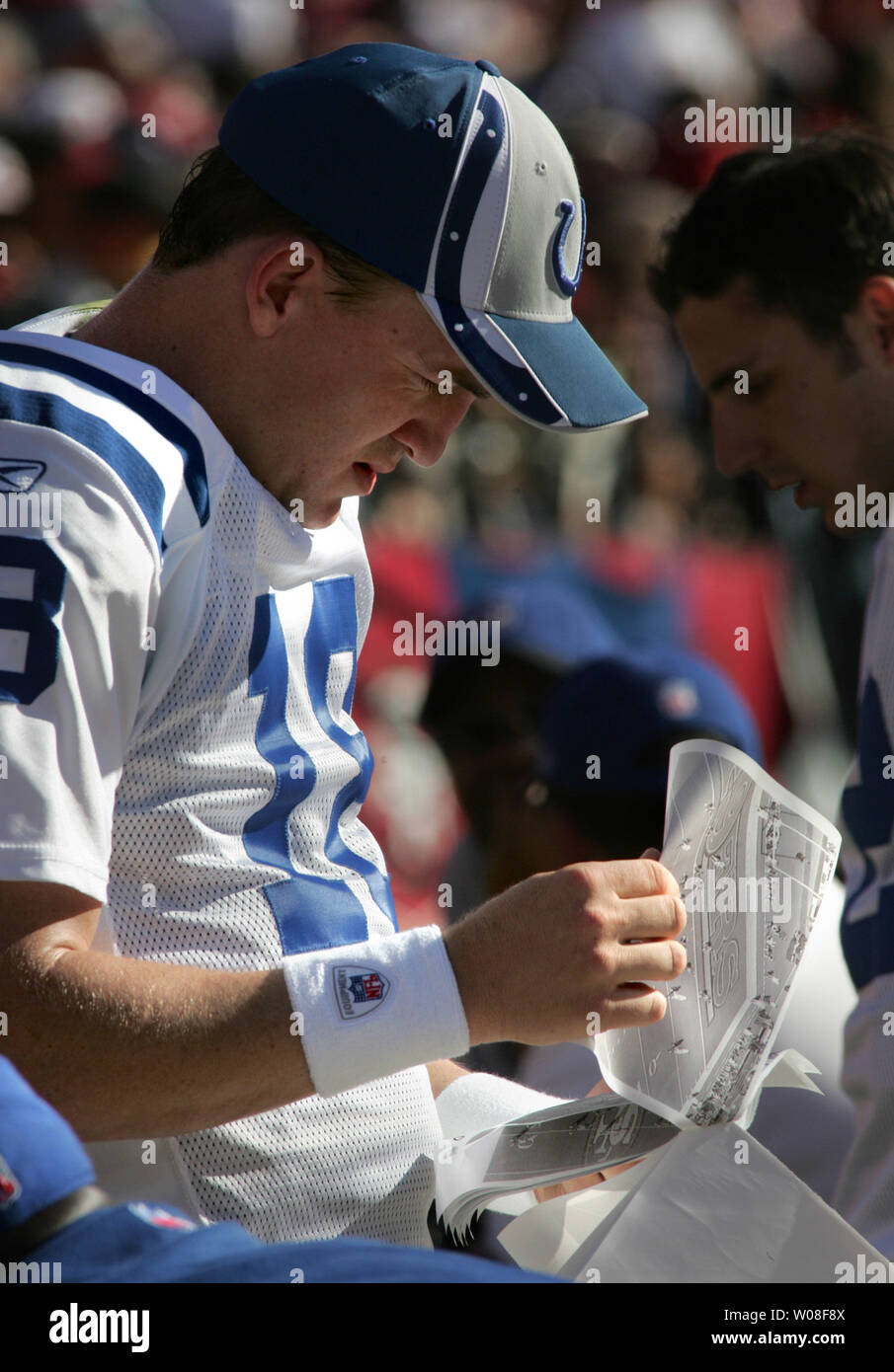 Indianapolis Colts QB Peyton Manning reviews 49er formations as he waits for the defense to get the ball during play against the San Francisco 49ers at Monster Park in San Francisco on October 9, 2005.  (UPI Photo/Terry Schmitt) Stock Photo