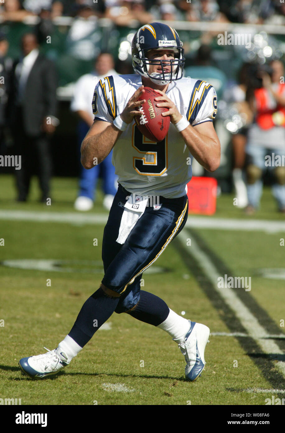 San Diego Chargers pro bowl quarterback Drew Brees tooses a pass during  drills at the team's training camp Tuesday Aug. 16, 2005 in San Diego. The  Chargers placed the franchise tag on