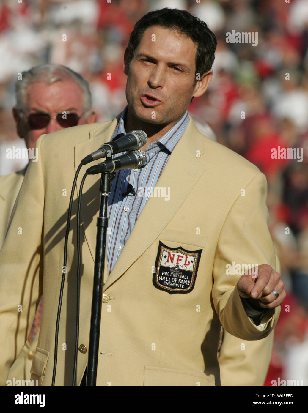 Hall of Fame QB Steve Young speaks at Monster Park in San Francisco on November 20, 2005. Young was honored as a new enshrinee to the Hall.  (UPI Photo/Terry Schmitt) Stock Photo