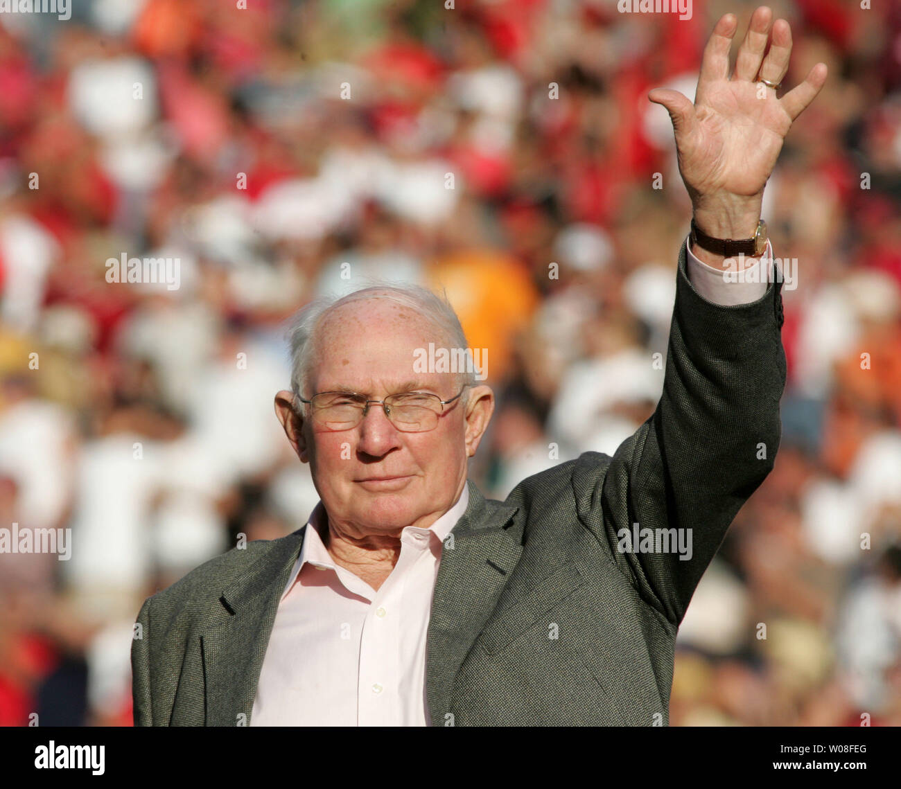 Hall of Fame QB Y. A. Tittle waves to the crowd at Monster Park in San Francisco on November 20