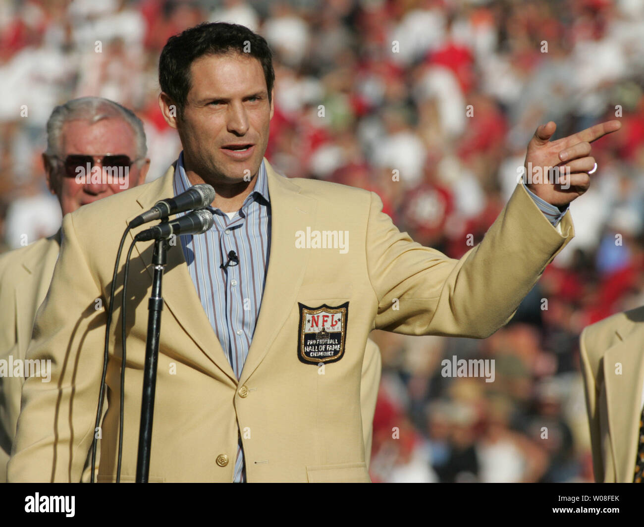 Hall of Fame QB Steve Young speaks at Monster Park in San Francisco on November 20, 2005. Young was honored as a new enshrinee to the Hall.  (UPI Photo/Terry Schmitt) Stock Photo