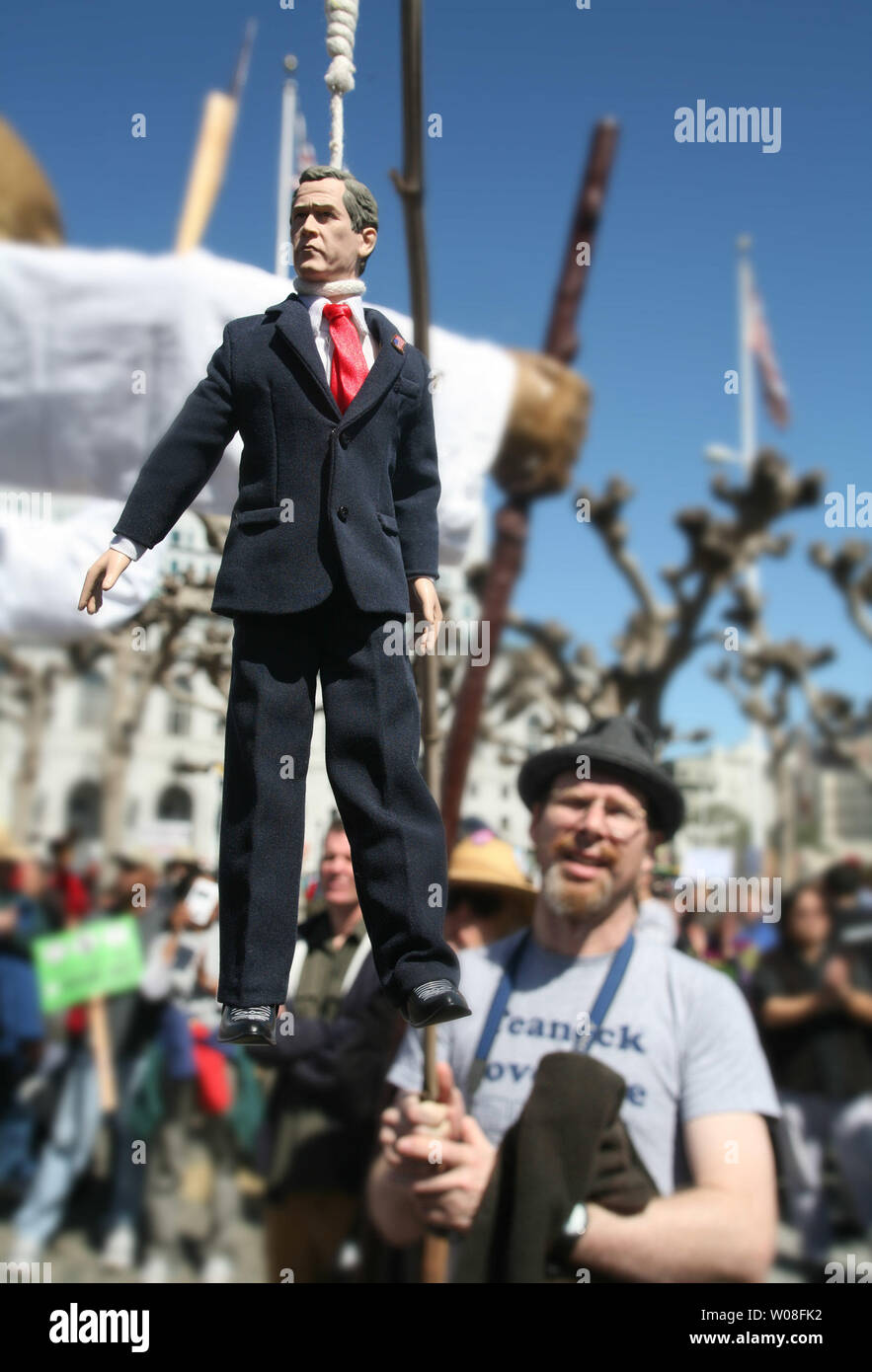 a-protester-holds-up-an-effigy-of-president-george-bush-at-a-demonstration-and-march-marking-the-third-anniversary-of-the-us-invasion-of-iraq-at-the-civic-center-in-san-francisco-on-march-18-2006-upi-phototerry-schmitt-W08FK2.jpg