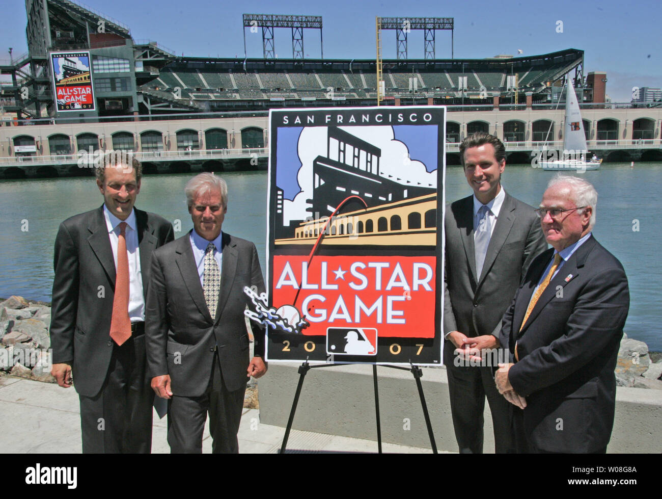 Mayor of San Francisco Gavin Newsom holds an All-Star game jersey