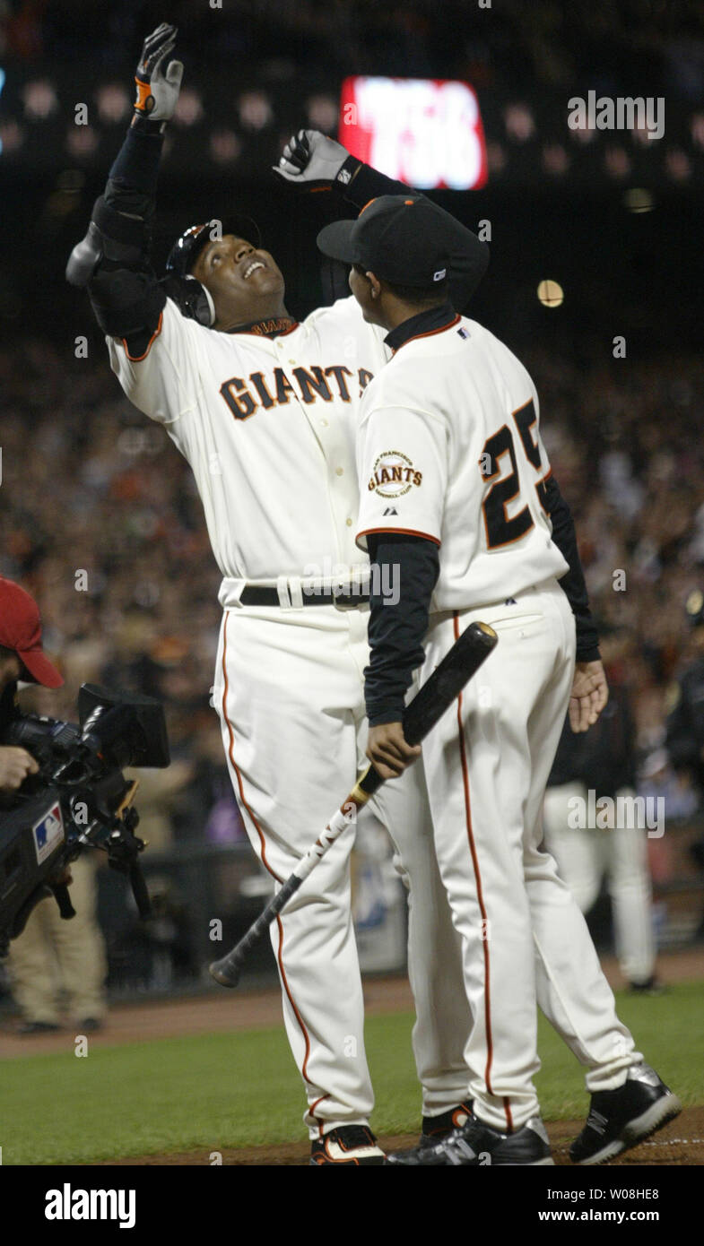 San Francisco Giants Barry Bonds celebrates at home plate with his son Nikolai after hitting his 756th career home run passing Hank Aaron for the all time home run record against the Washington Nationals at AT&T Park in San Francisco on August 7, 2007.    (UPI Photo/Bruce Gordon) Stock Photo