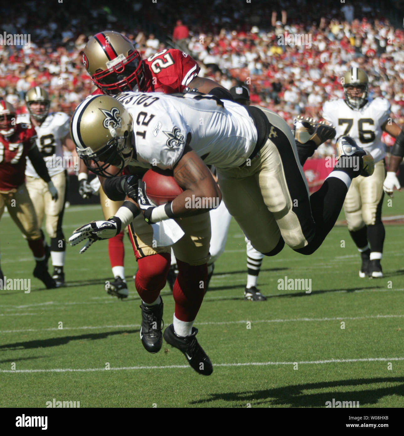 New Orleans Saints WR Marques Colston (12) dives into the end zone  past  San Francisco 49ers Mark Roman with a Drew Brees pass in the first quarter at Monster Park in San Francisco on October 28, 2007.  The Saints defeated the 49ers 31-10. (UPI Photo/Bruce Gordon) Stock Photo