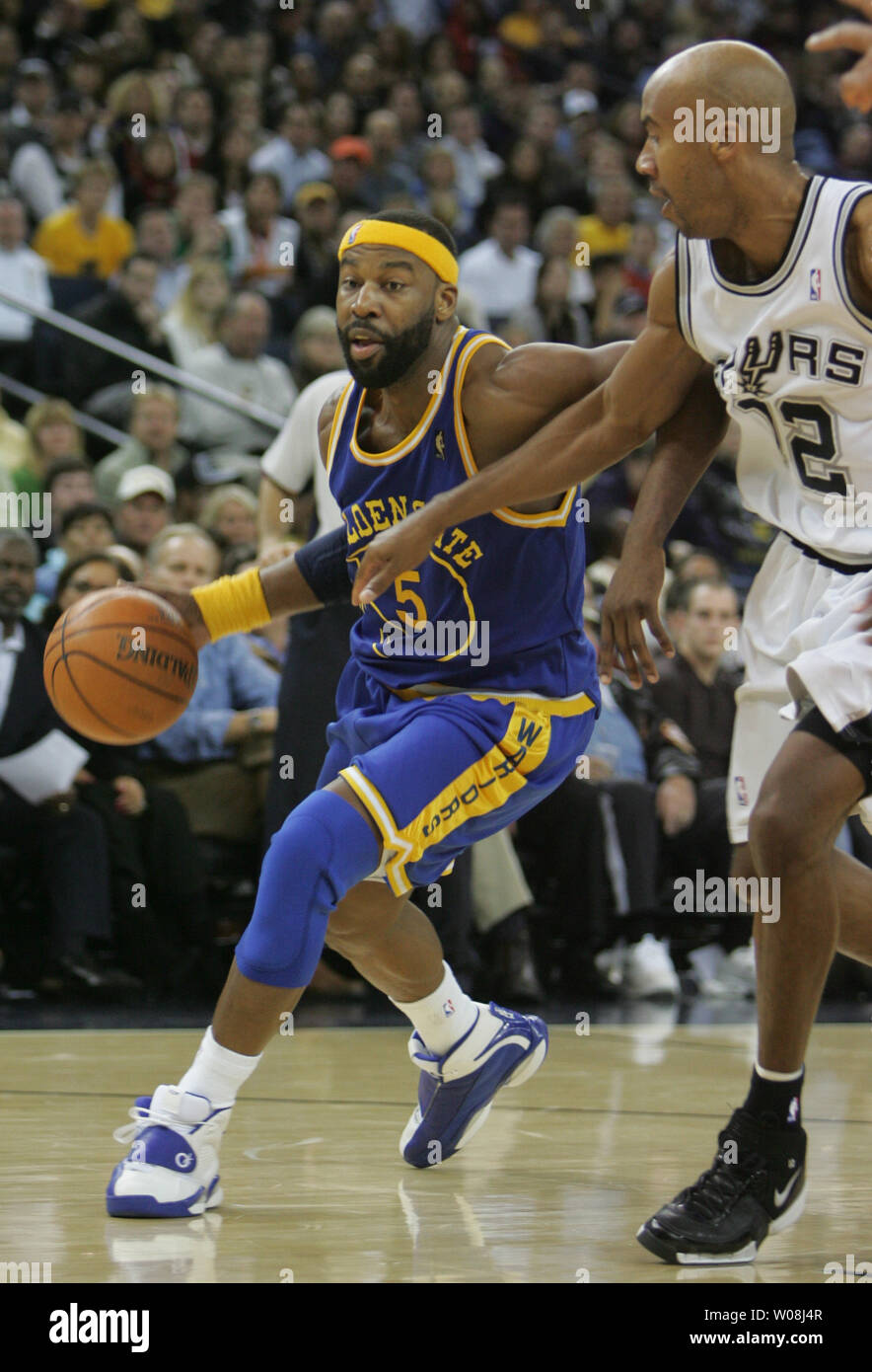 San Antonio Spurs forward Manu Ginobili brings the ball upcourt against the  Denver Nuggets at Pepsi Center in Denver, Colorado December 31, 2005. (UPI  Photo/Gary C. Caskey Stock Photo - Alamy