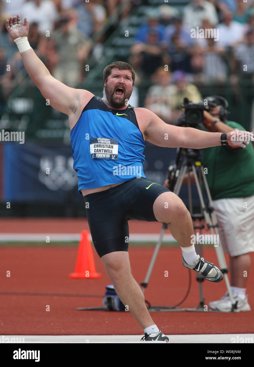 U.S. shot putter Christian Cantwell yells as he watches his throw go 21