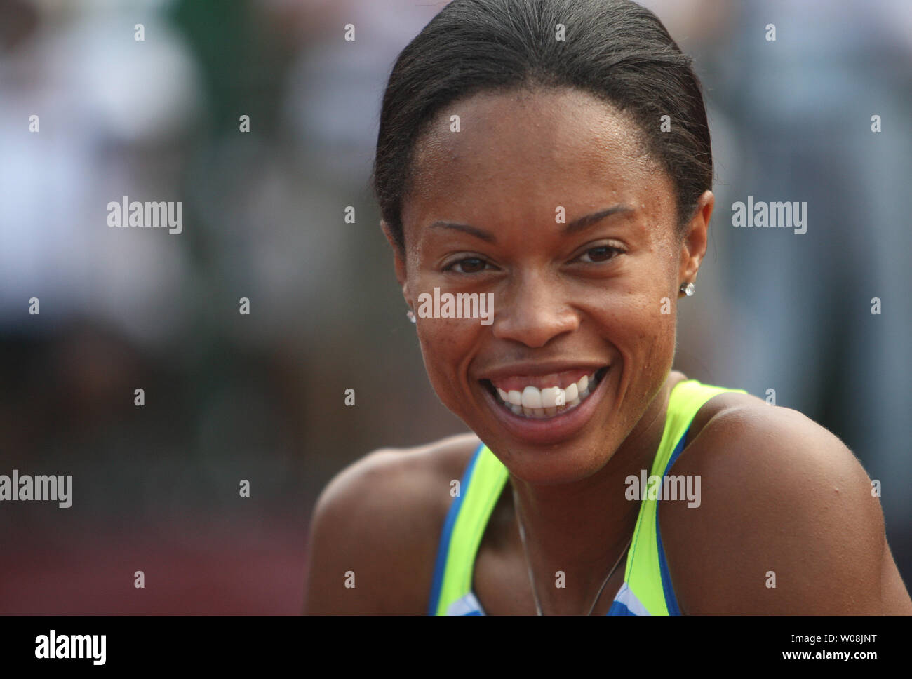 U.S. sprinter Muna Lee grins after taking first place in the finals of the 100 meters at the USA Track and Field trials in Eugene Oregon on June 28, 2008.    (UPI Photo/Terry Schmitt) Stock Photo