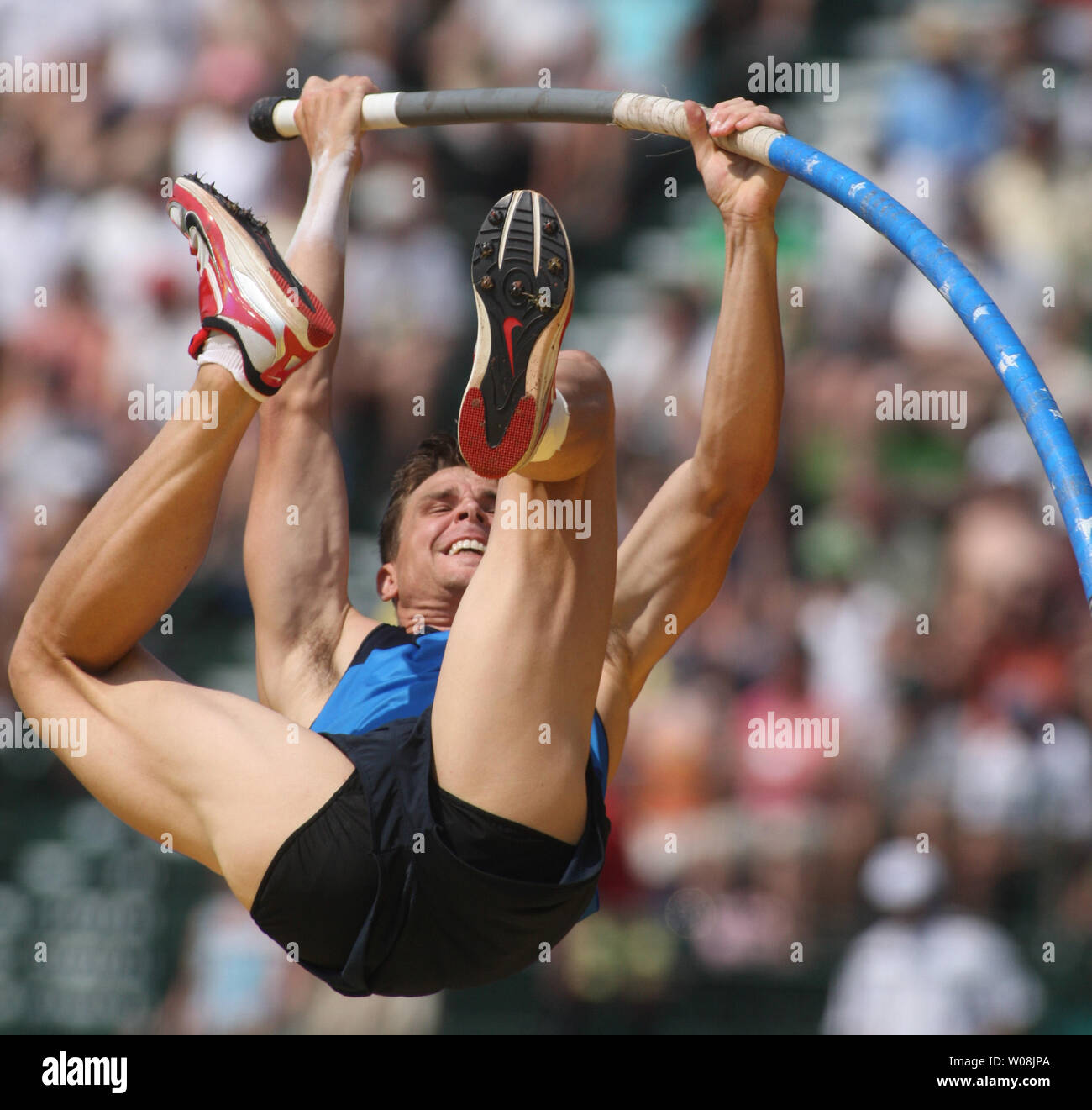 Derek Miles launches in the pole vault at the U.S. track and field Olympic trials in Eugene, Oregon on June 29, 2008. Miles cleared 5.80 meters to win and make the U.S. Olympic team.   (UPI Photo/Terry Schmitt) Stock Photo