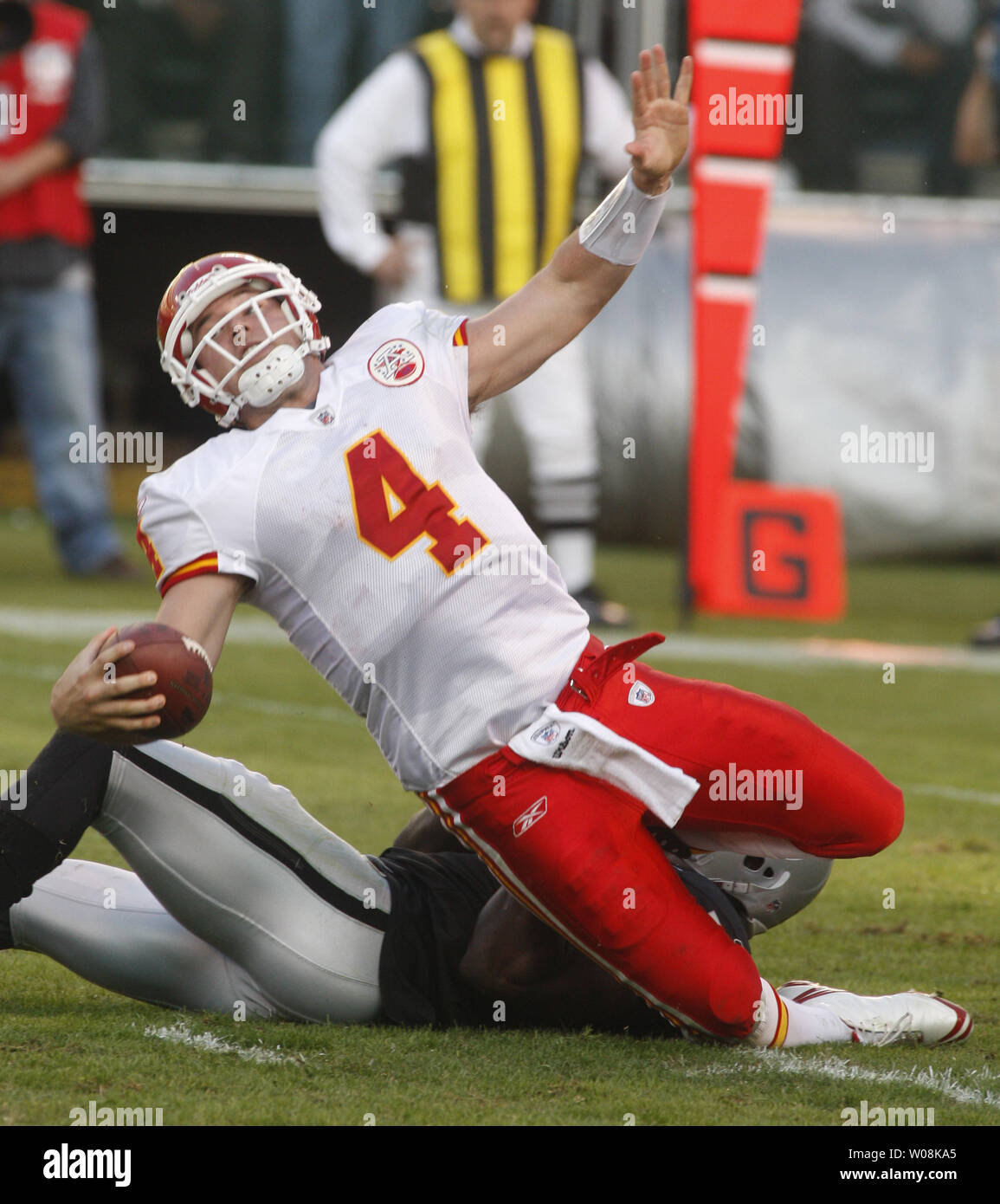 Kansas City Chiefs QB Tyler Thigpen (4) is spilled on a whistled play  against the Oakland Raiders in the third quarter at the Oakland Coliseum in Oakland, California on November 30, 2008. The Chiefs defeated the Raiders 20-13.   (UPI Photo/Terry Schmitt) Stock Photo