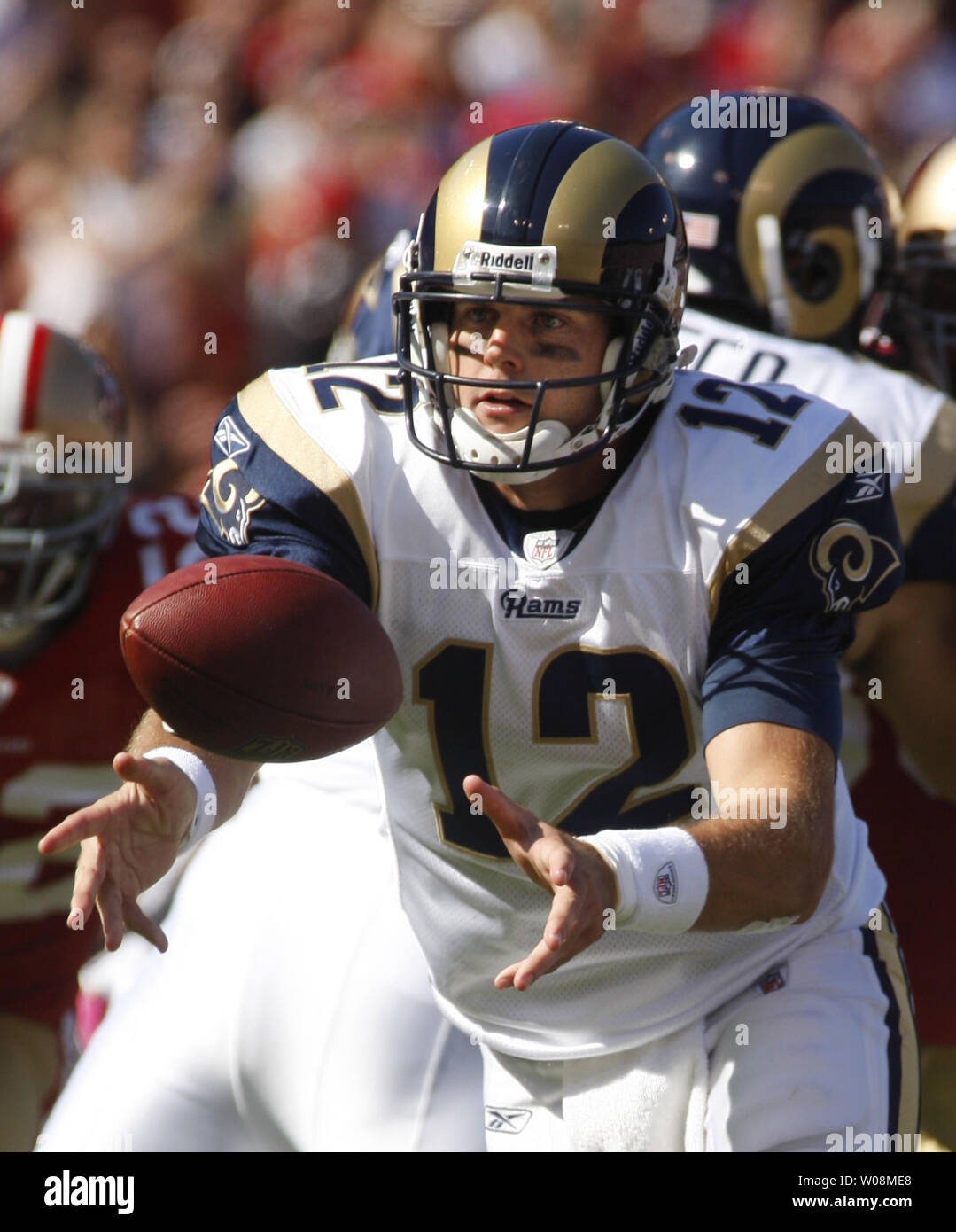 St. Louis Rams QB Kyle Boller (12) pitches the ball to a running back in play against the San Francisco 49ers at Candlestick Park in San Francisco on October 4, 2009. The 49ers defeated the Rams 35-0.    UPI/Terry Schmitt Stock Photo