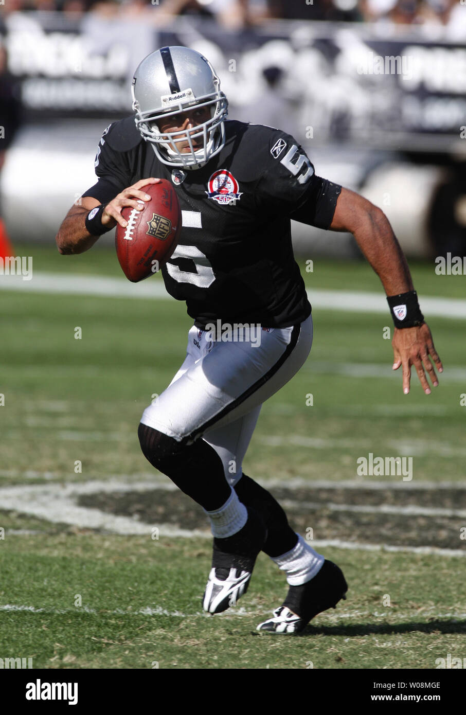 Oct 25, 2009 - Oakland, California, U.S. - Oakland Raiders vs New York Jets  at Oakland-Alameda County Coliseum Sunday, October 25, 2009. New York Jets  linebacker Calvin Pace #97 strips ball from